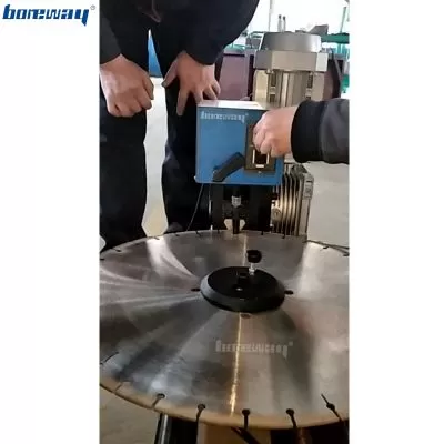 Automatic Hammer Machine For Removal Of Useless Segments From Diamond Saw Blade